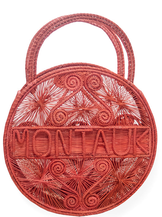 Coral Pink 100 % Handwoven Black, Iraca Palm Bag with “Montauk” Woven Across Front