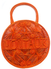 Orange Crush 100 % Handwoven Black, Iraca Palm Bag with “Montauk” Woven Across Front