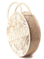 Natural Colored  100 % Handwoven , Iraca Palm Bag with “Sagharbor” Woven Across Front side view